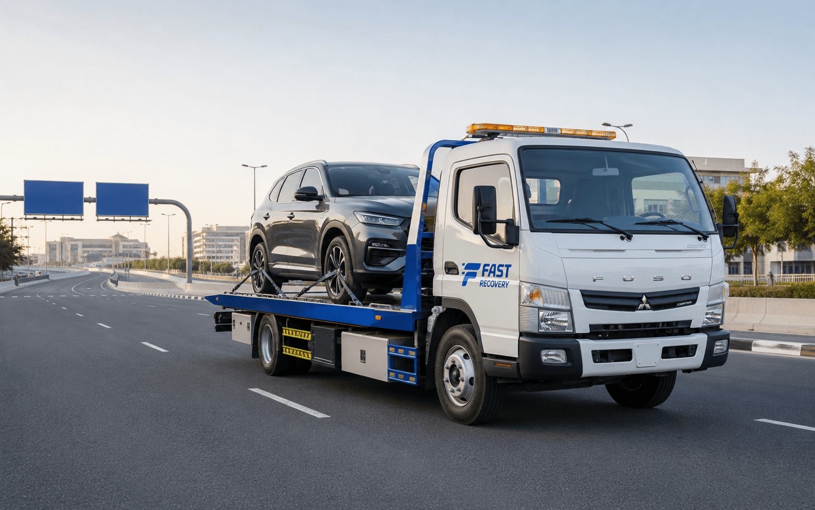 FAST RECOVERY flatbed truck providing vehicle recovery coverage across Dubai